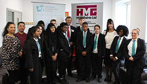 Managing Director with Manchester Communication Academy Students & Charity representatives.